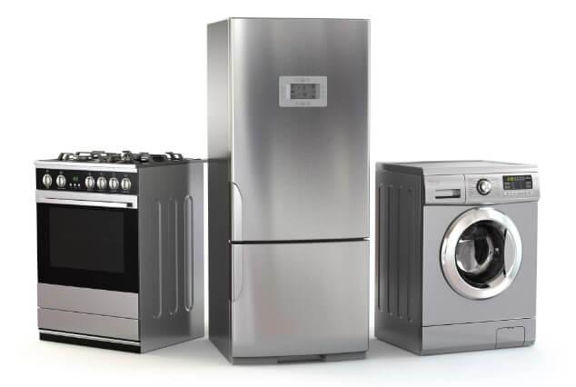 appliance specialist at work on faulty oven